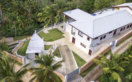 Exclusive Hilltop Villa with Panoramic Ocean and Mountain Views